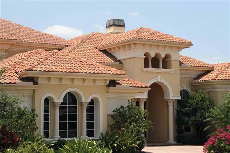 mediterranean house metal roof blue shutters|mediterranean roof designs.